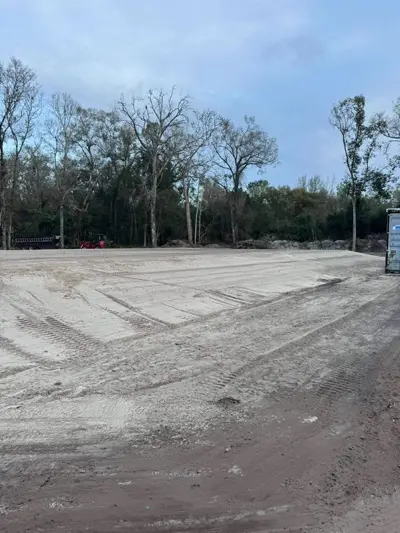 Compacted house building pad ready for foundation construction by Dirt Dynamics